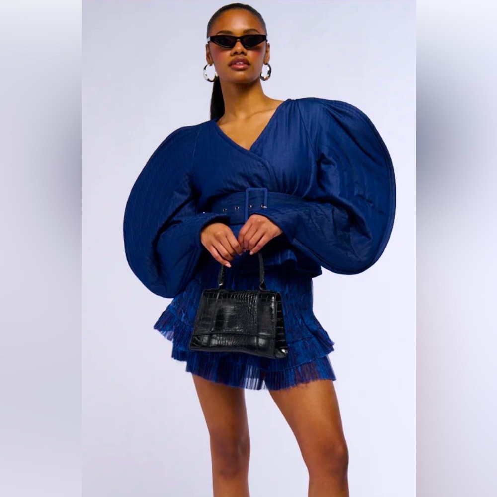 Dramatic, avant- garde, edgy belted denim blouse/jacket. Be bold & beautiful.